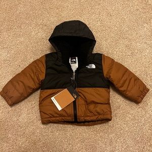 The North Face reversible baby down jacket